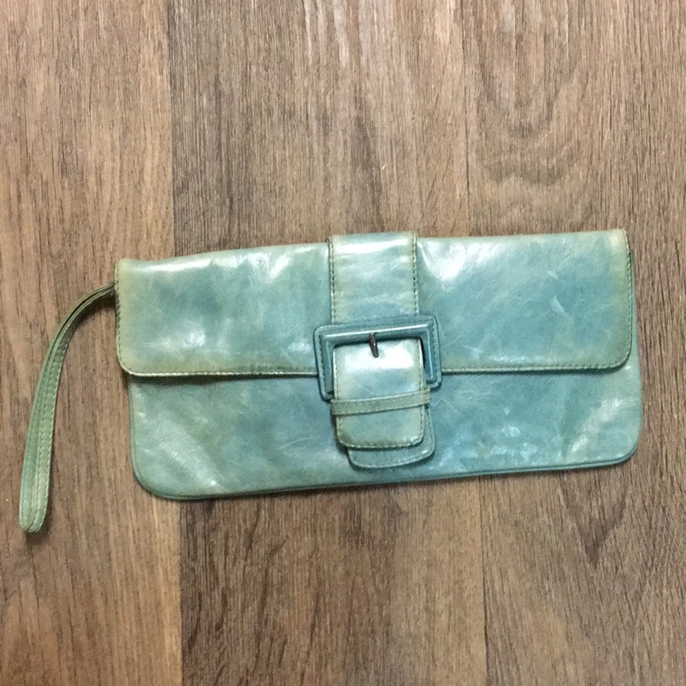 5x10 clutch with wrist strap. Fits 6 credit cards